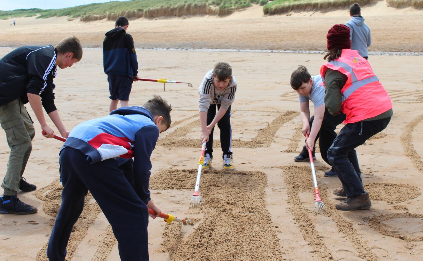 A group of students on the beach